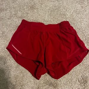 Lululemon hotty hot shorts. Size 4, length 2.5. Color: Love red